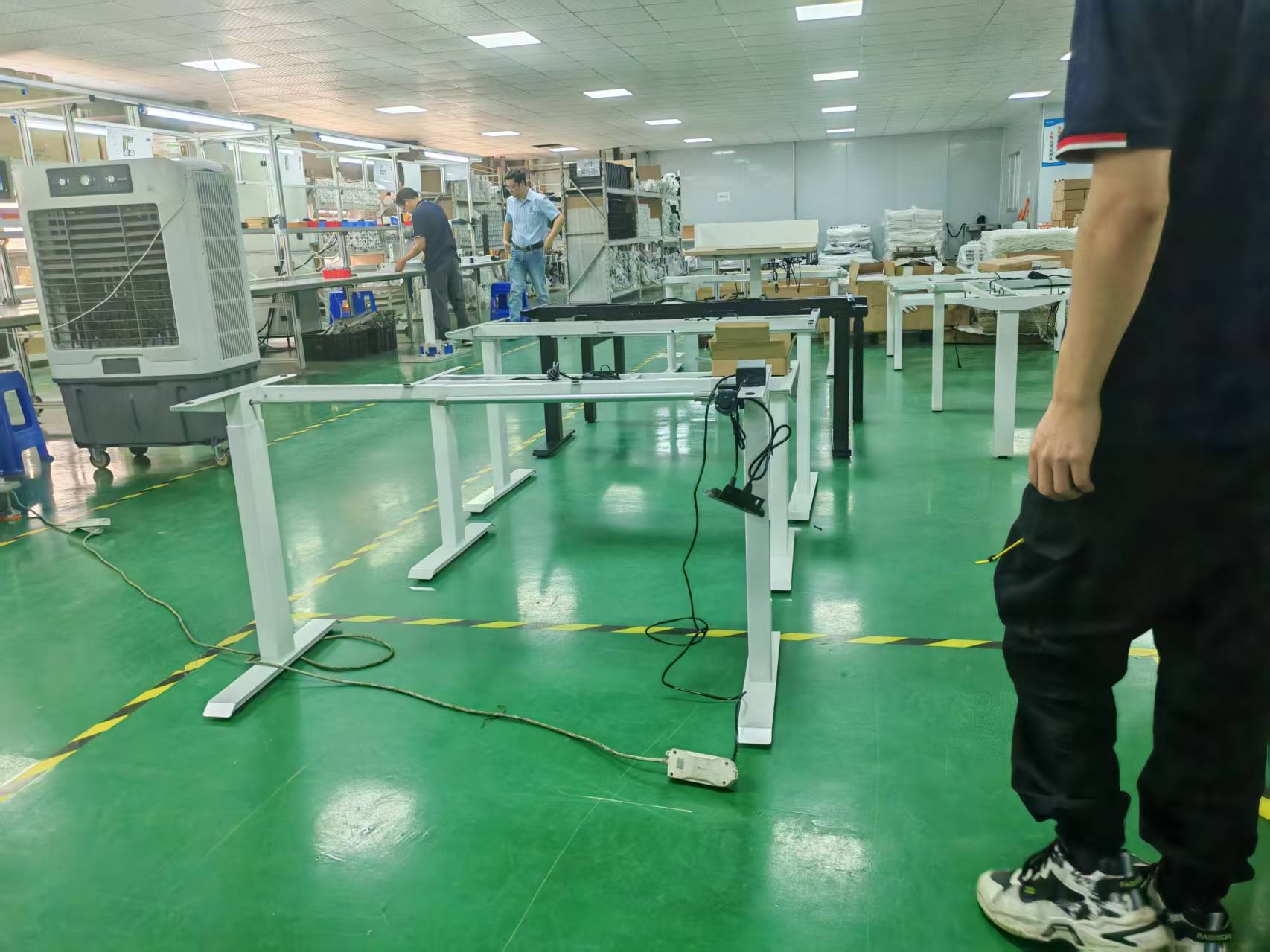 Hərəkətdə Dəqiqlik: Niyə Huagang Elektrikli Daimi Masa Çərçivələri Sabitliyi Müəyyən edir